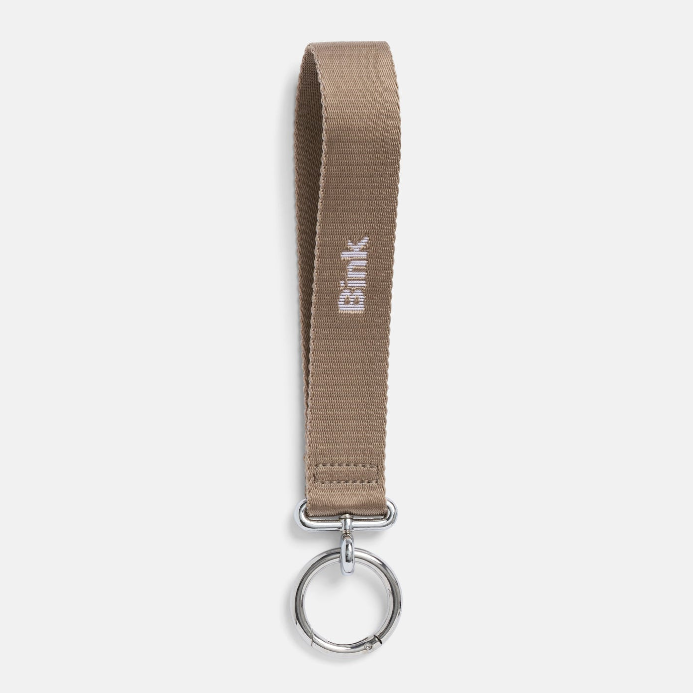 Brown keychain with a ring on a white background